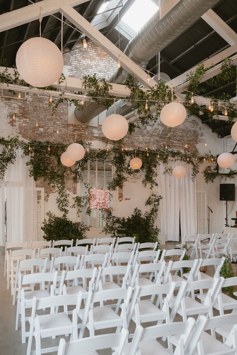 A couple's venue as it looks today, bare chairs and an empty aisle