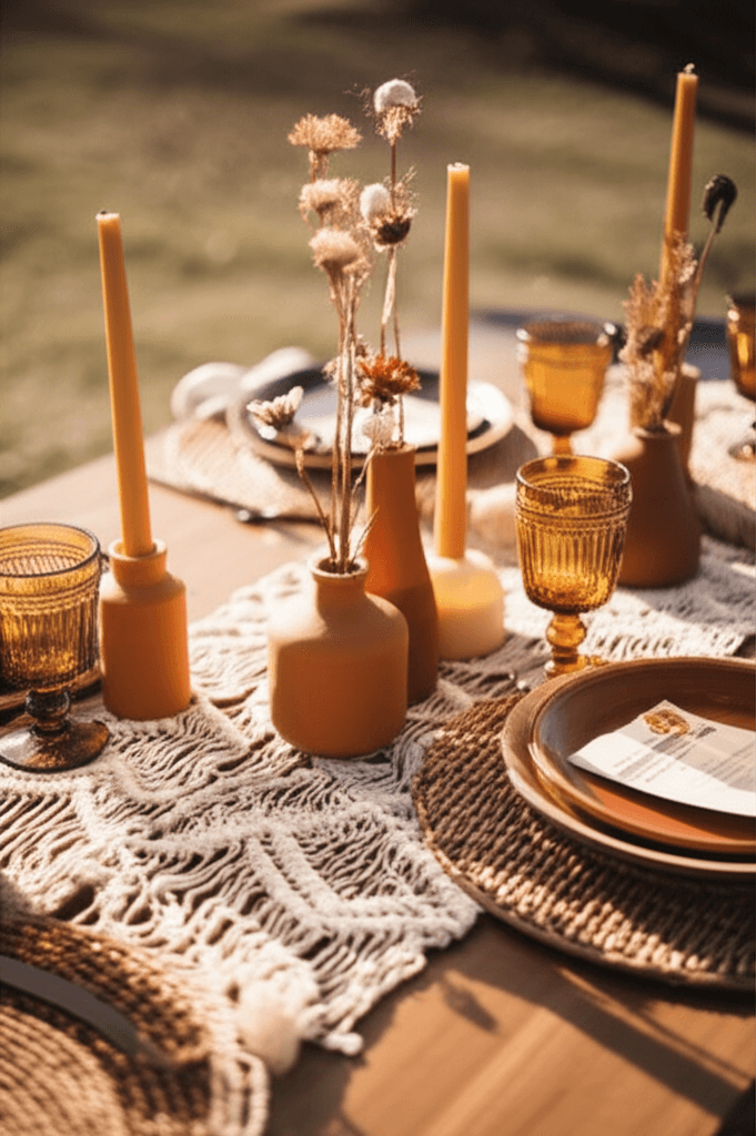 Eclectic bohemian wedding table setting with jute runner, stoneware, and rattan chargers
